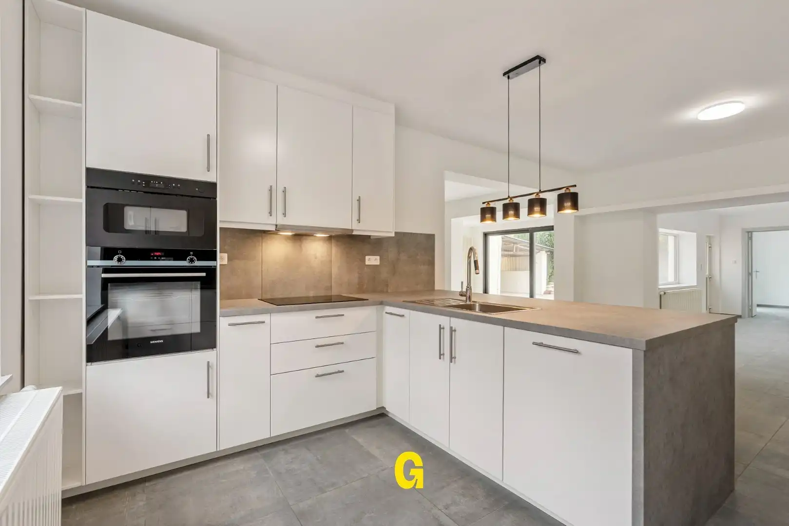 Vakkundig gerenoveerde woning met binnenkoer, tuin en bijgebouwen op 4a 62ca - EPC label B foto 10