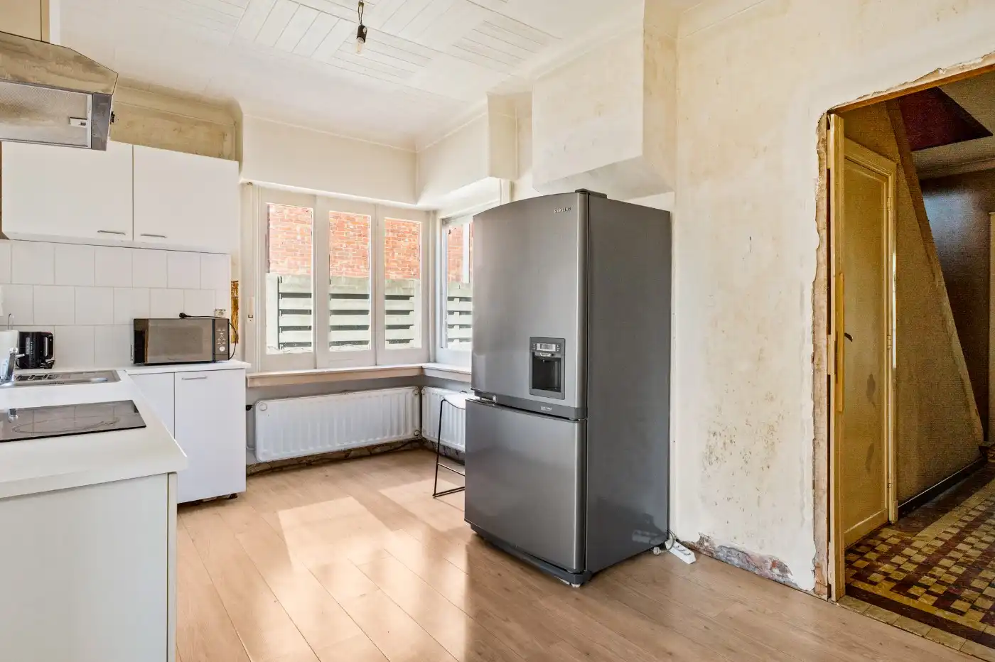 Charmante, te renoveren woning met 2 slpk., garage en tuin foto 8