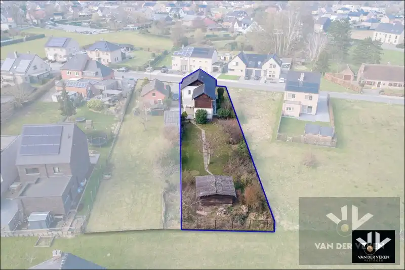 Bouwgrond +- 10 aren (huidige woning wordt afgebroken door de huidige eigenaars) voor open bebouwing op een rustige, maar zeer goed bereikbare locatie in het charmante Diepenbeek foto 2