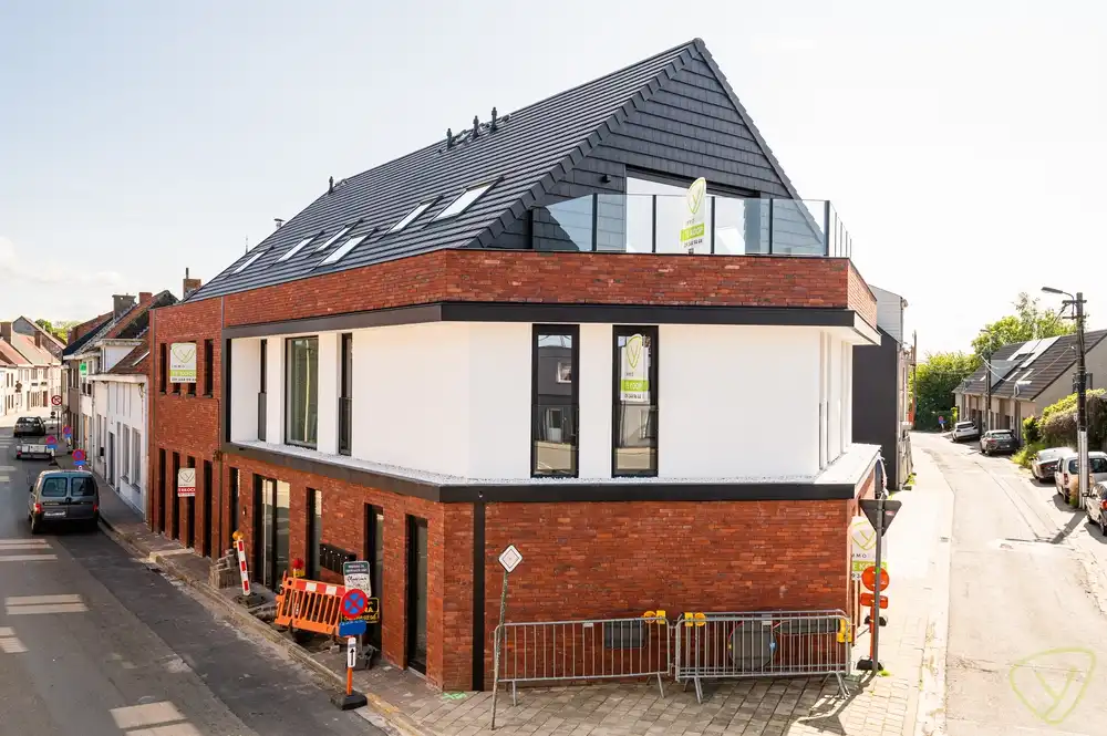 Kleinschalige nieuwbouwresidentie te koop in het centrum van Boekhoute foto {{pictureIndex}}