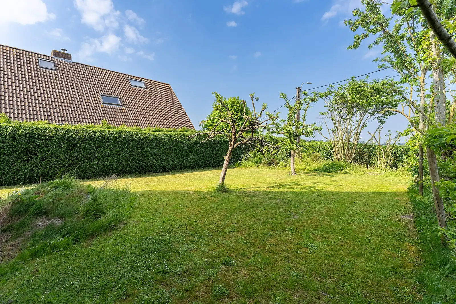 Zeer ruime woning op een perceel van 1000m² met dubbele garage in het landelijke Houtave. foto 34