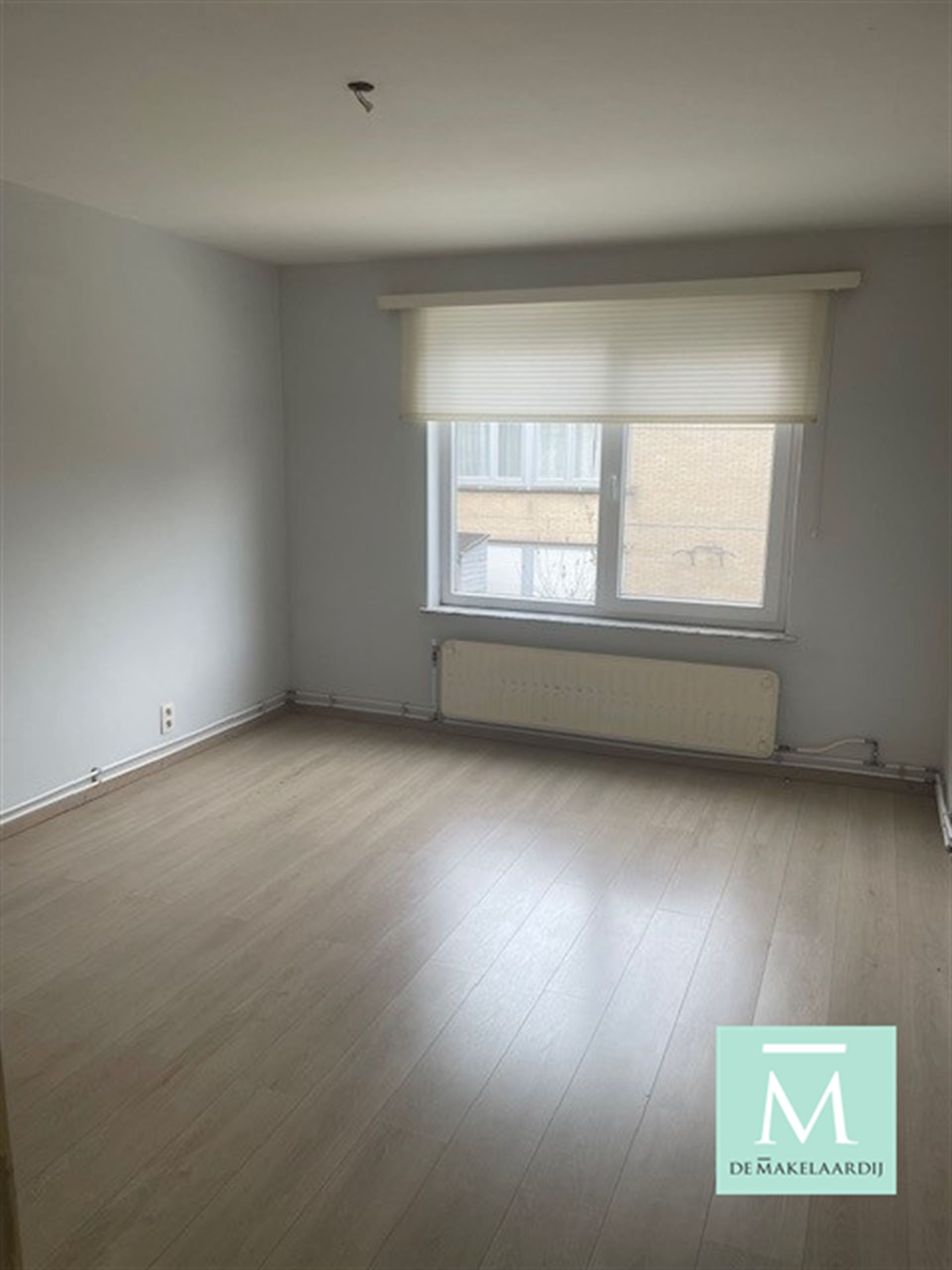 Mooi gelegen, instapklaar appartement met 2 slaapkamers en klein terrasje achteraan! foto 6