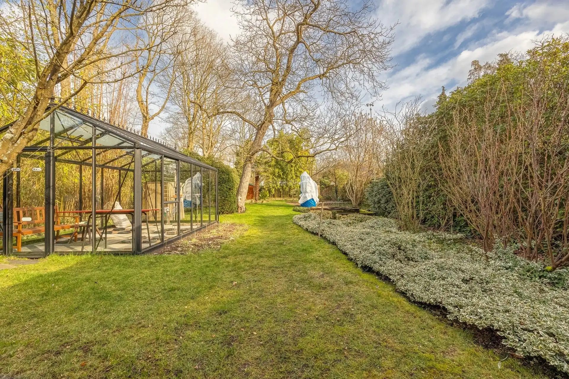 Unieke kans in het hart van Brasschaat karaktervolle villa met dubbele woningstructuur op prachtig perceel van 2.080 m² foto 6