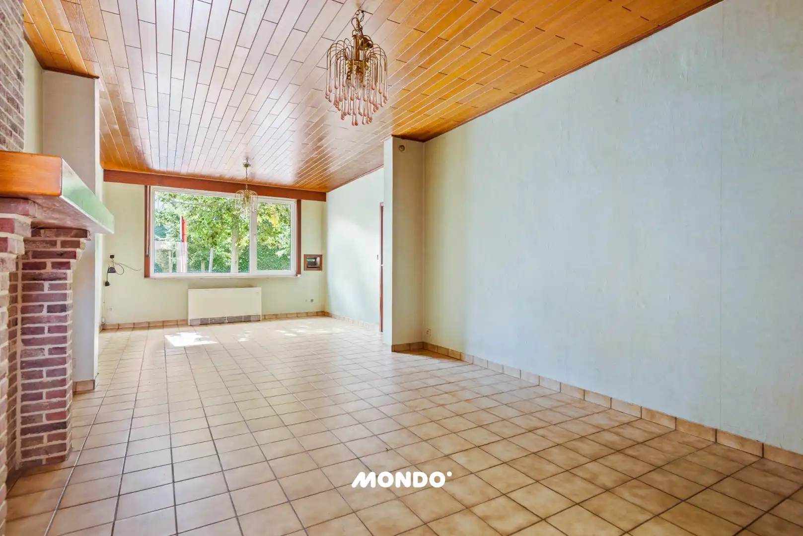 Veelzijdige rijwoning met tuin, binnenkoer en uitbouwmogelijkheden te Opwijk! foto 6