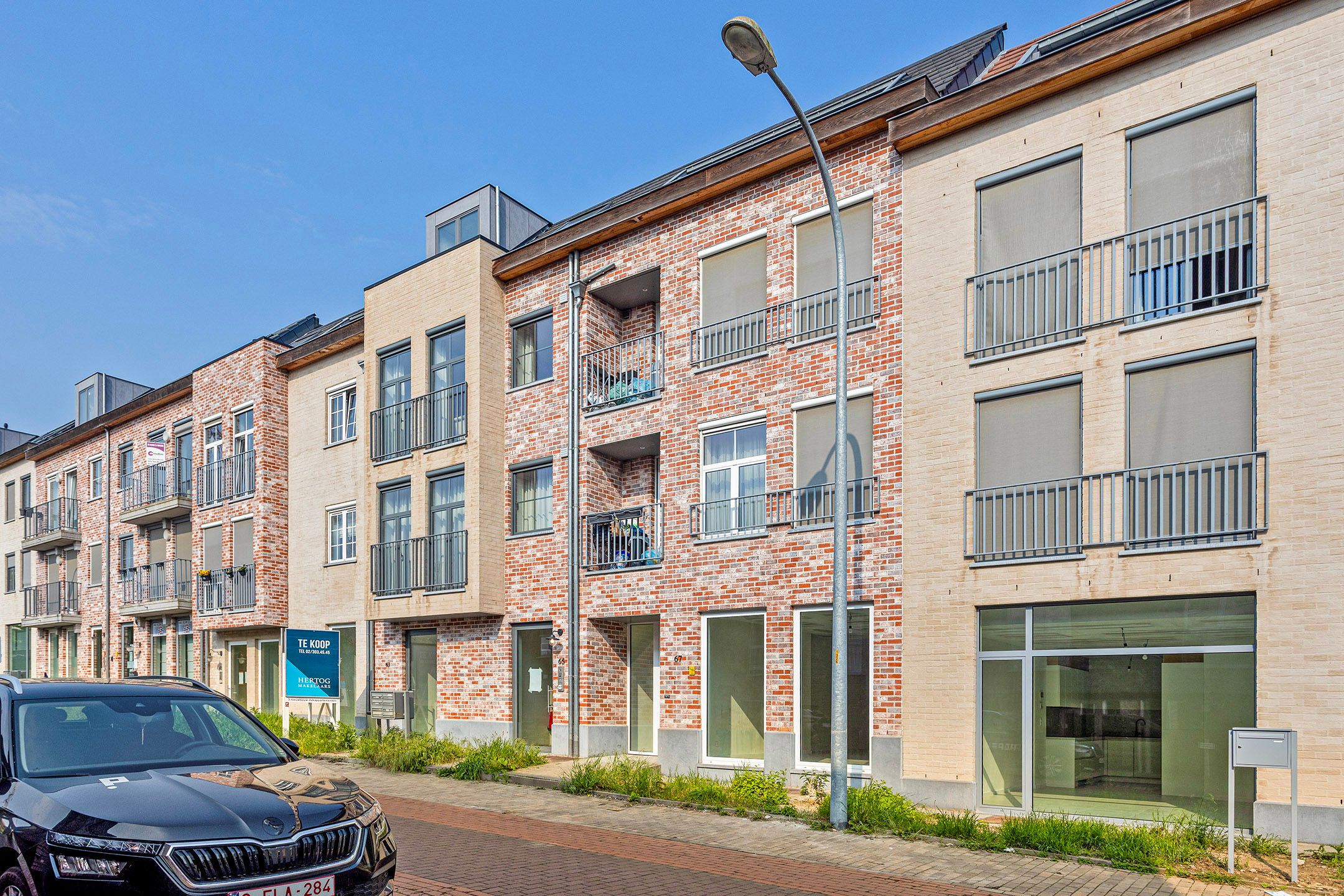 Gelijkvloers nieuwbouwappartement met tuin foto {{pictureIndex}}
