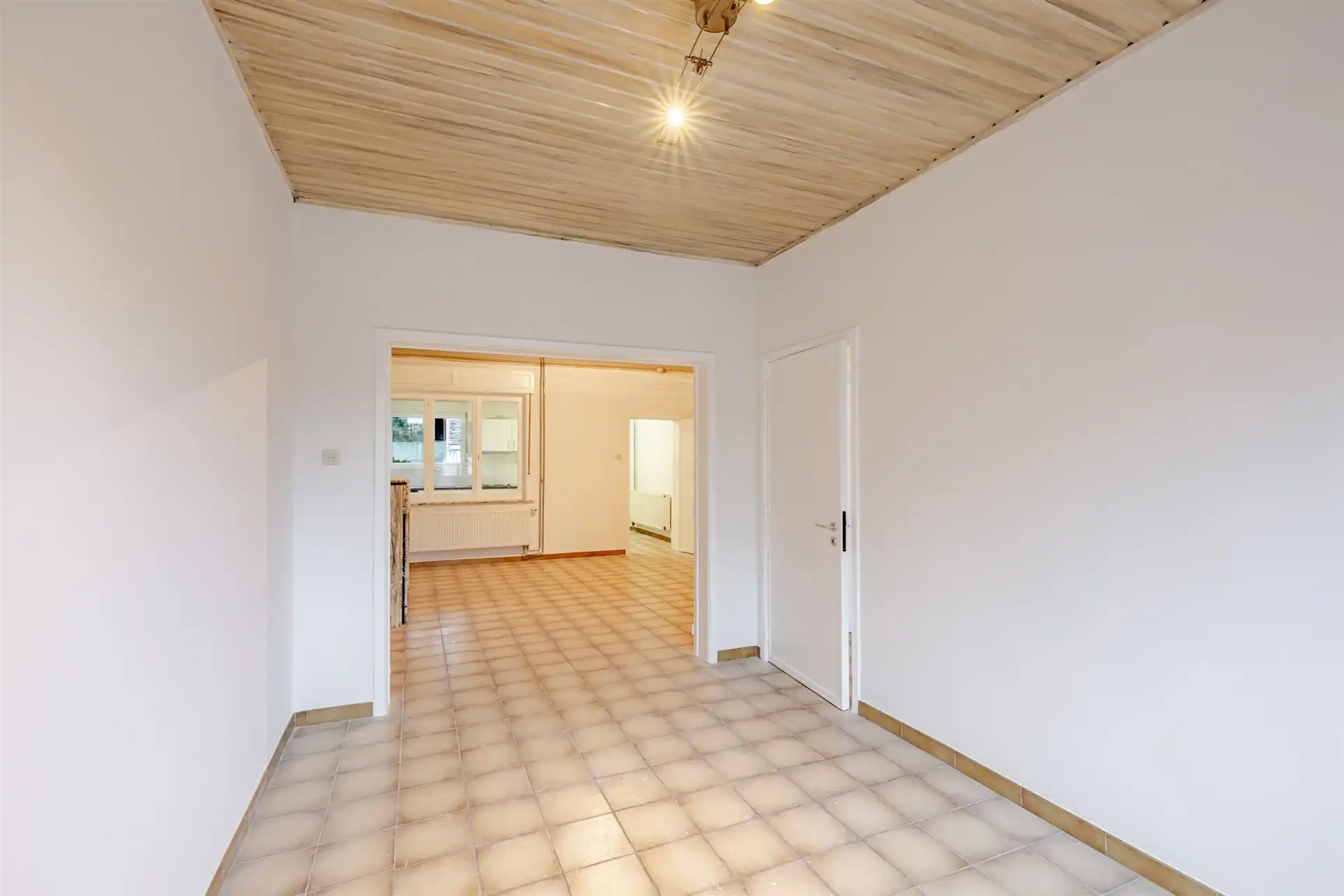 Charmante gezinswoning met tuin en zijdoorgang in rustige straat te Denderleeuw foto 5