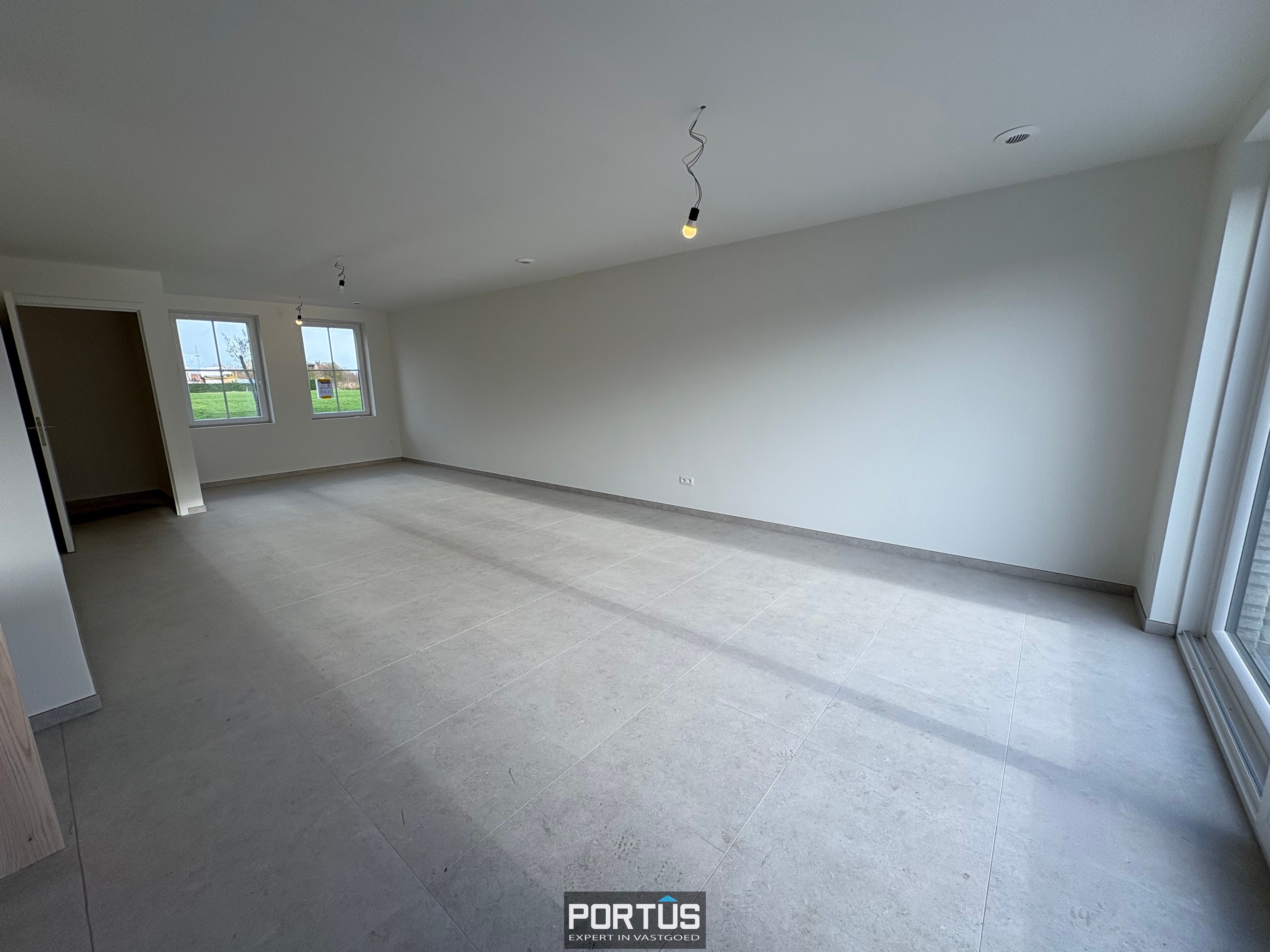 Energiezuinige nieuwbouwwoning met 3 slaapkamers en carport te huur foto 3