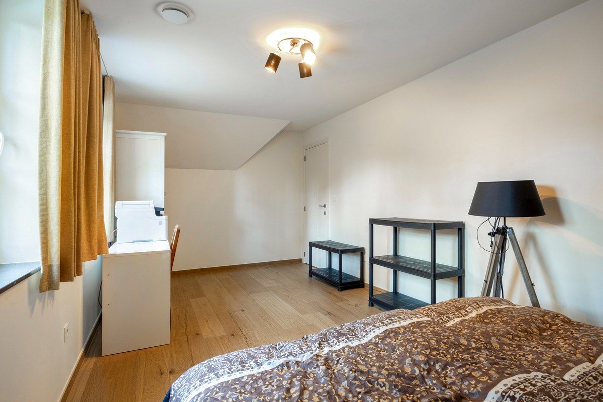 Ruim ingedeelde en kwalitatief afgewerkte villa op een mooi perceel met naastgelegen bouwgrond. foto 28