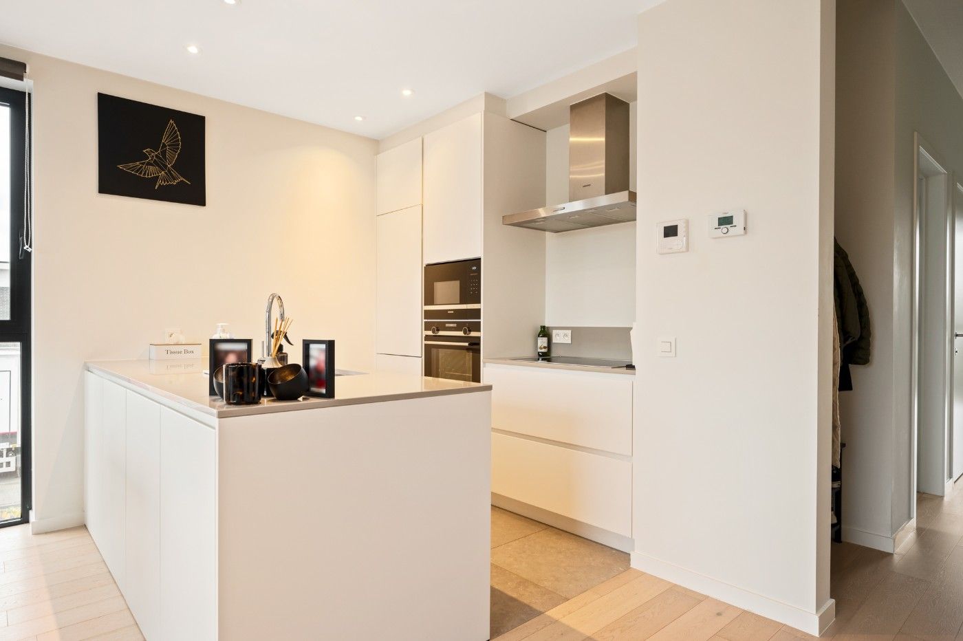 Instapklaar app. op 1ste verd. met 2 slpk., terras en autostaanplaats foto 10