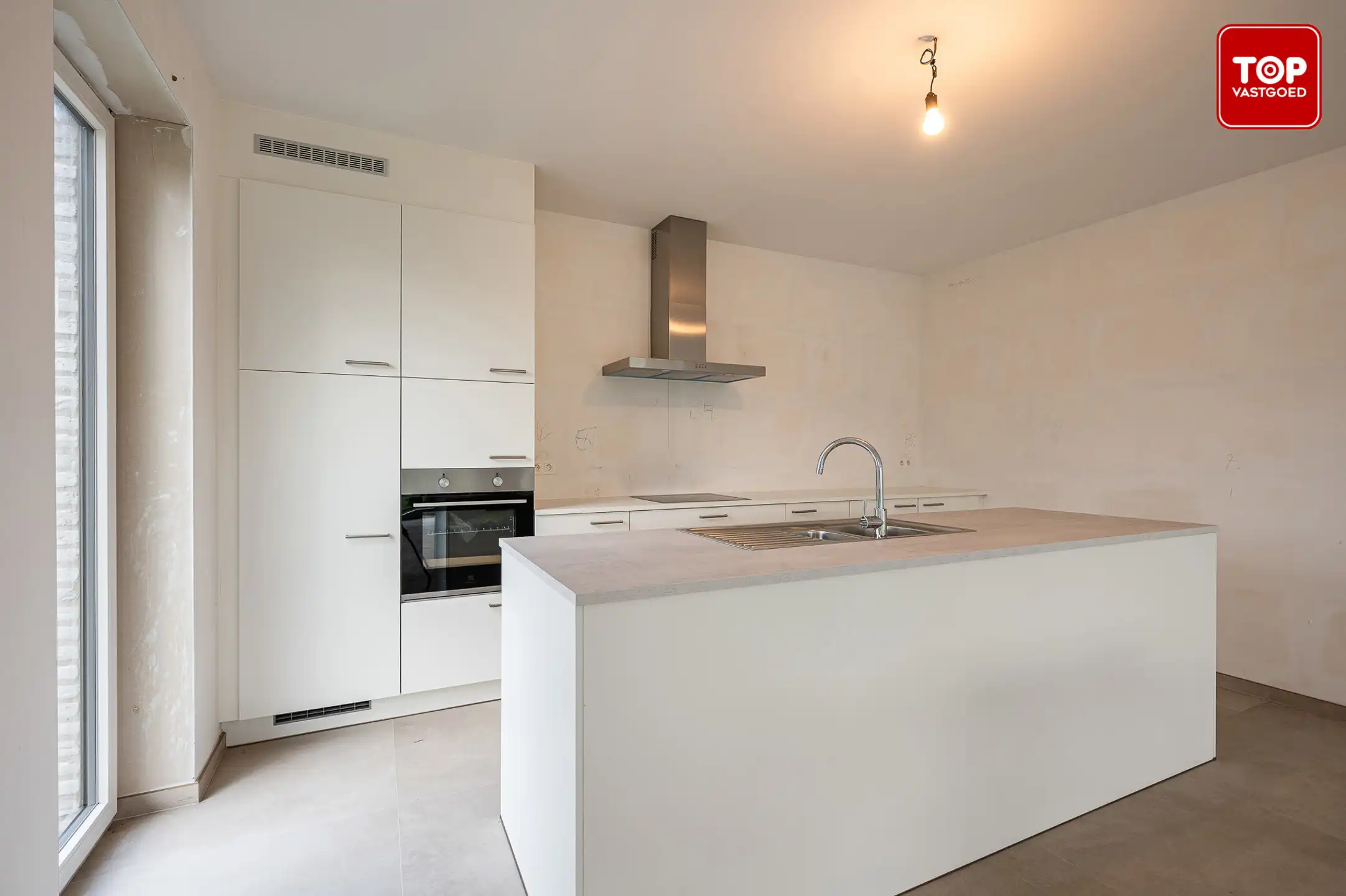 Ruim en lichtrijk nieuwbouwappartement met tuin foto 8