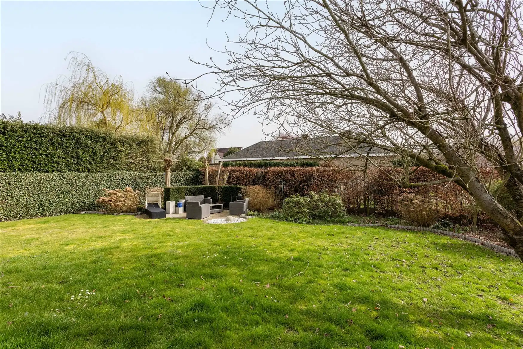 Ruime gezinswoning met 5 kamers nabij het centrum van De Pinte foto 4