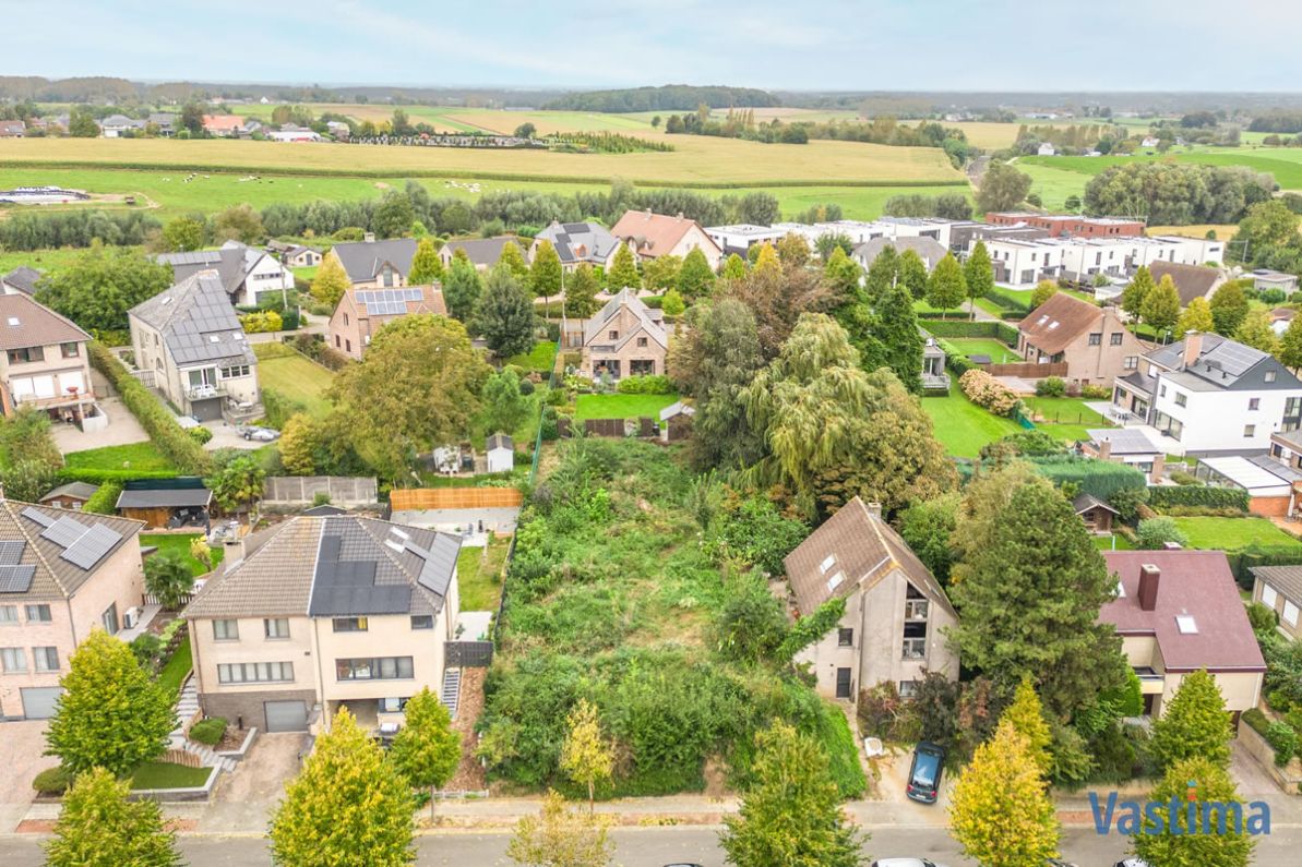 Bouwklare grond voor open bebouwing nabij centrum Asse foto 3