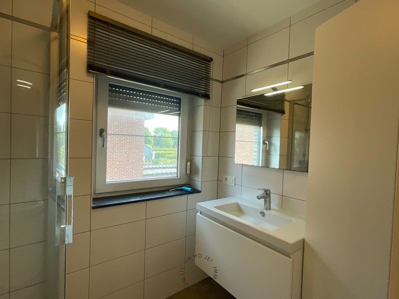 Halfopen bebouwing dichtbij centrum Beveren foto 18