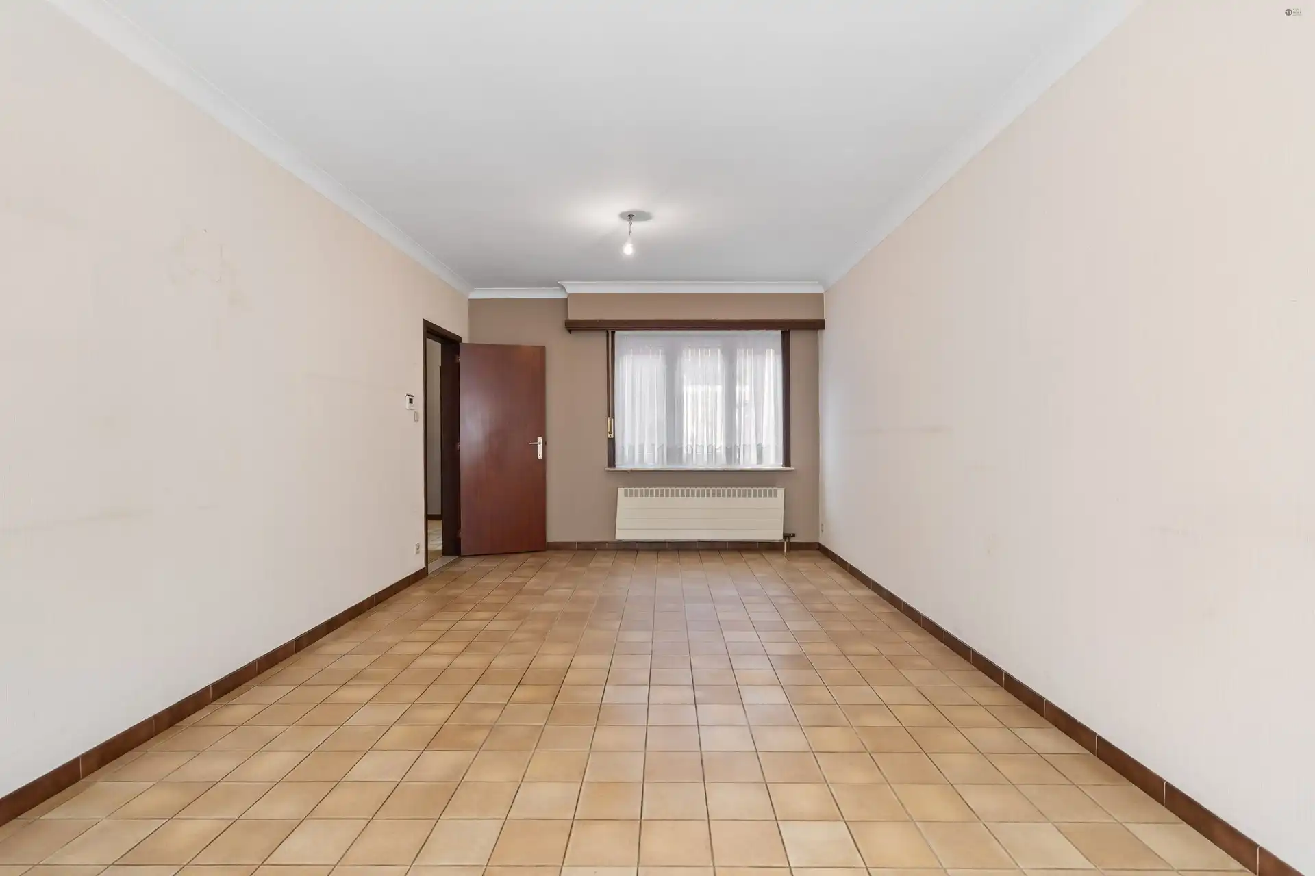 Opbrengsteigendom bestaande uit 3 kwalitatieve woningen met 3 garageboxen foto 4