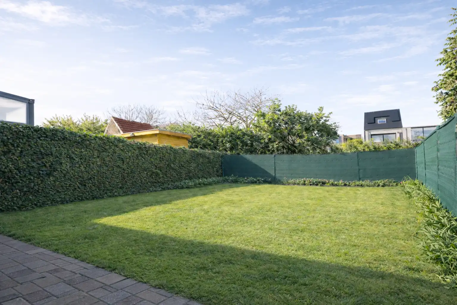 Recente woning met 3 grote slaapkamers, mooie tuin en mogelijkheid tot aankoop carport.  foto 6