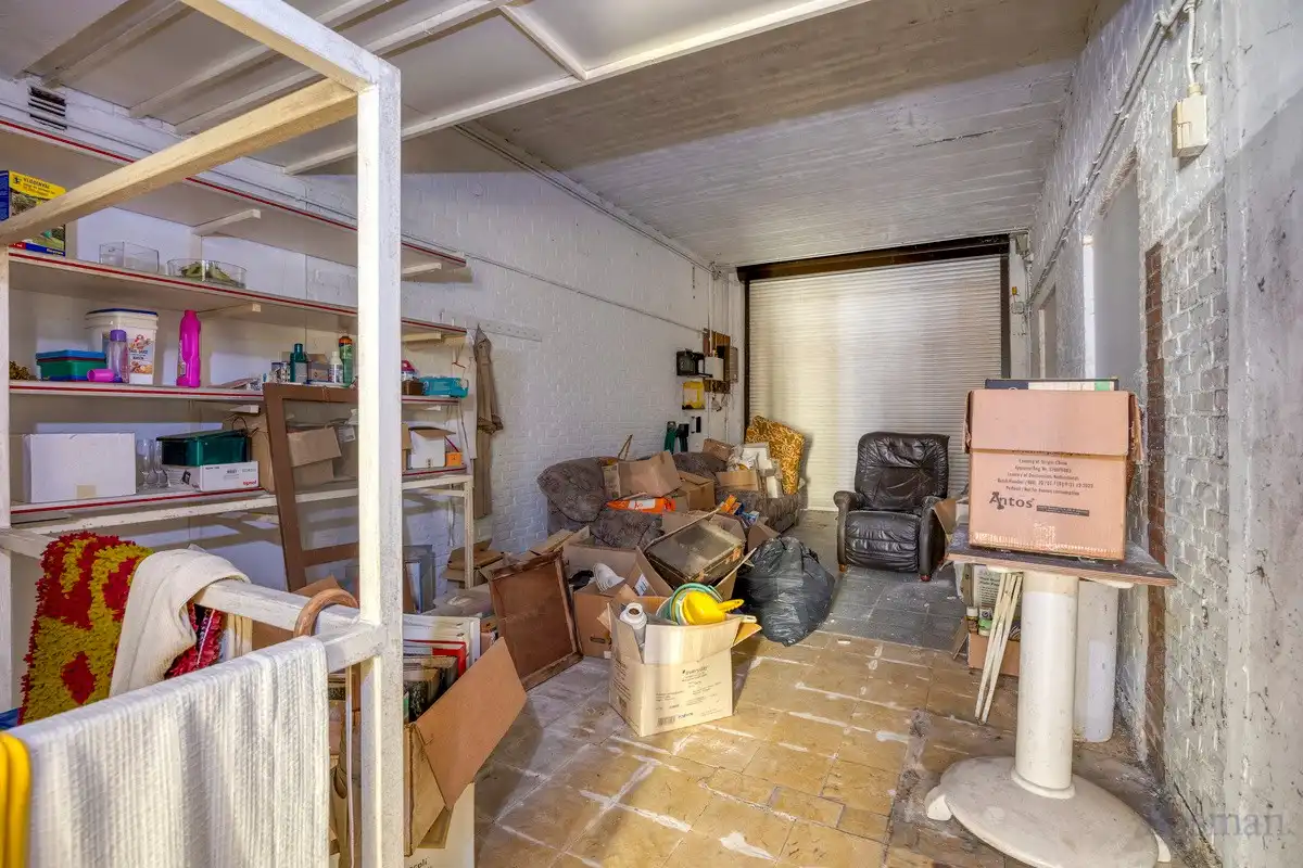 Te renoveren woning met 5 garageboxen te koop in Ham foto 28