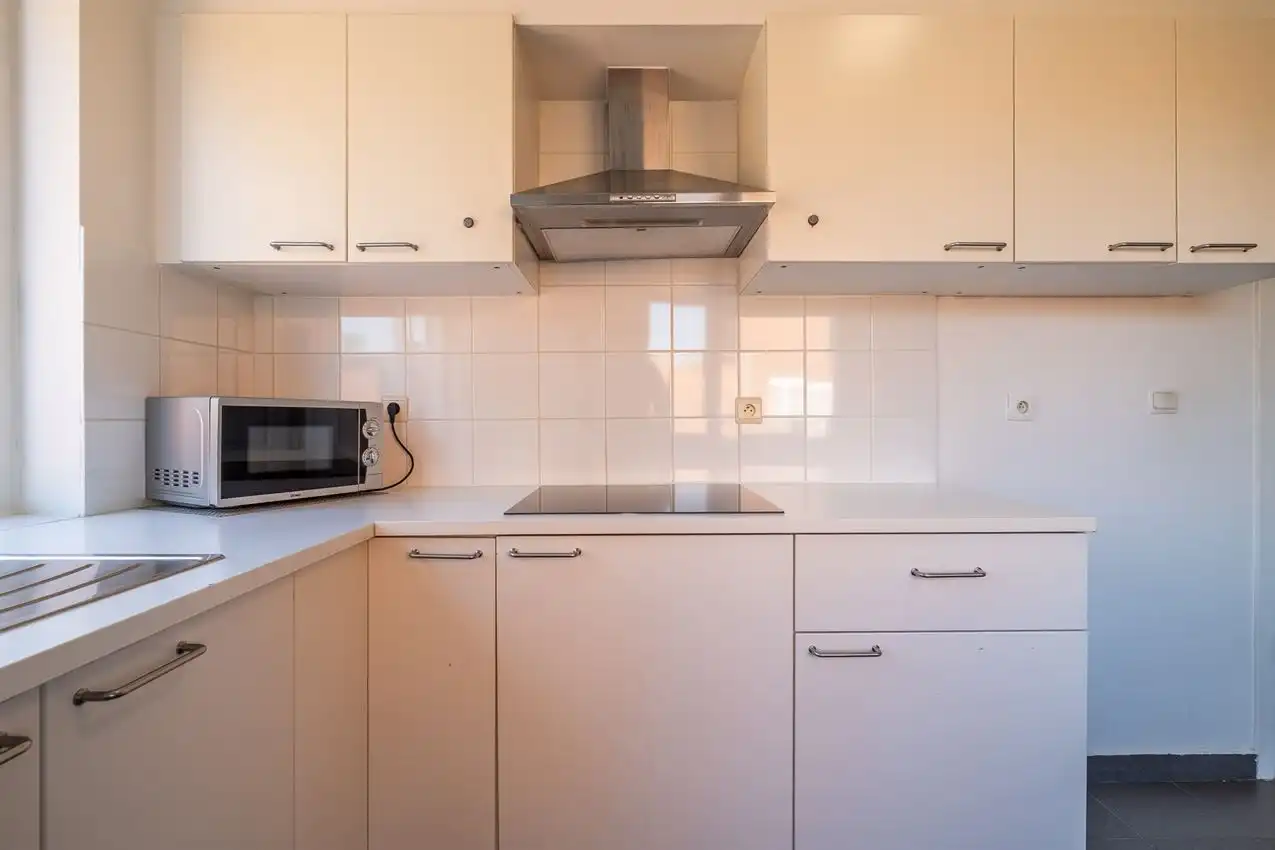 Verzorgde woning met 2 slpk., tuin en garage foto 10
