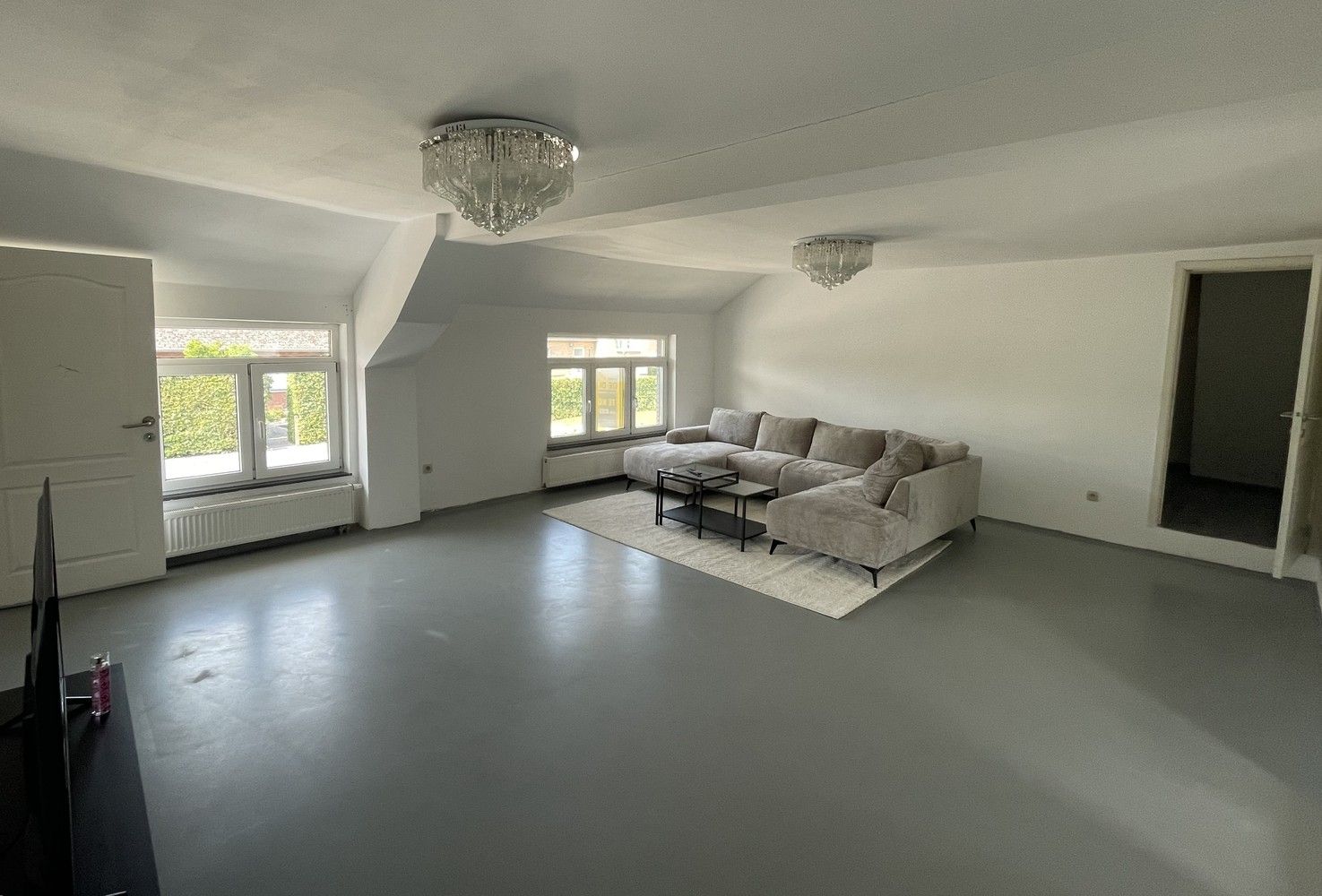 Handelspand met ruim duplexappartement op zichtbare locatie in Herent foto 8