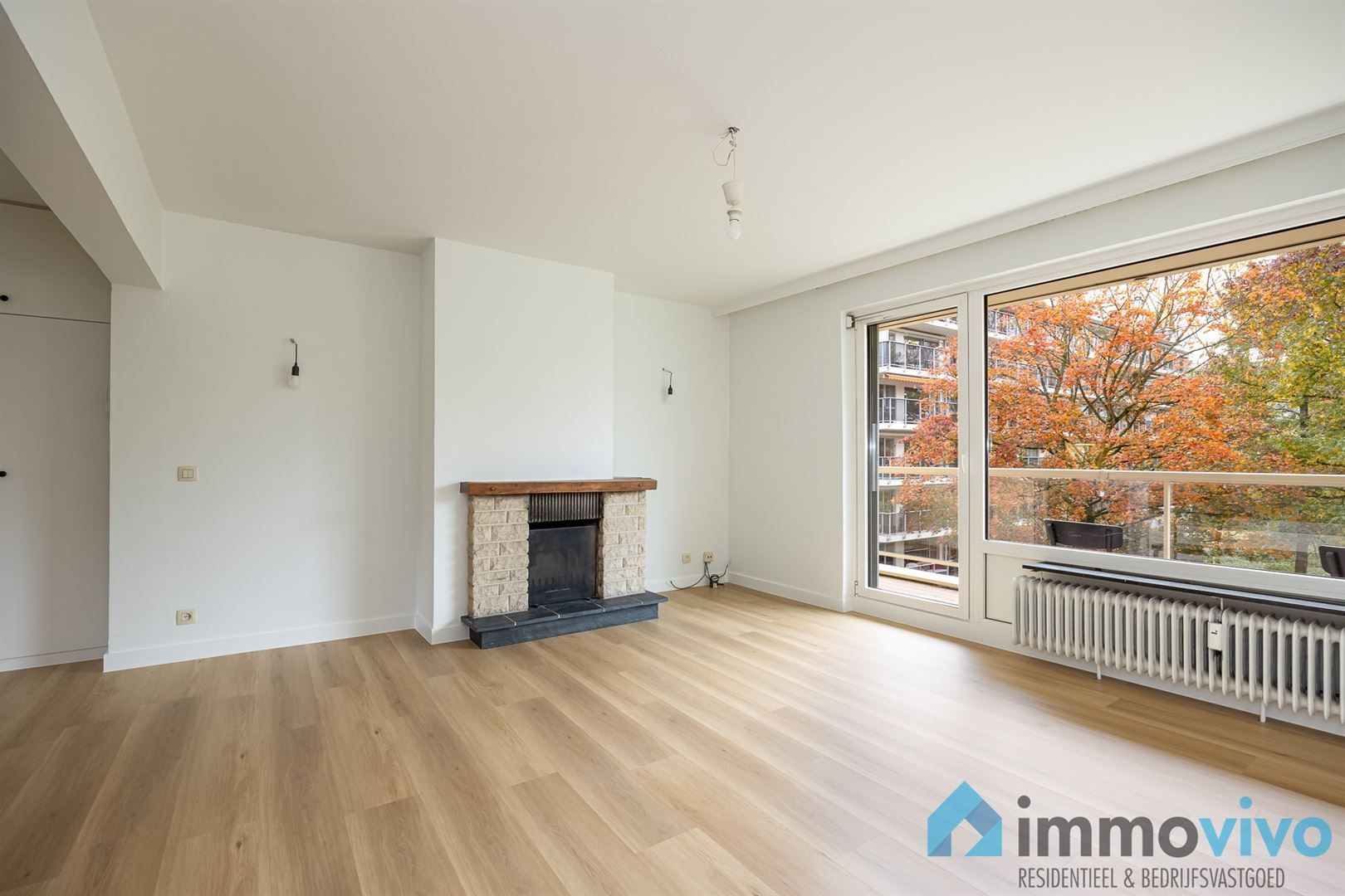 Instapklaar éénslaapkamerappartement met terras en parkzicht foto {{pictureIndex}}