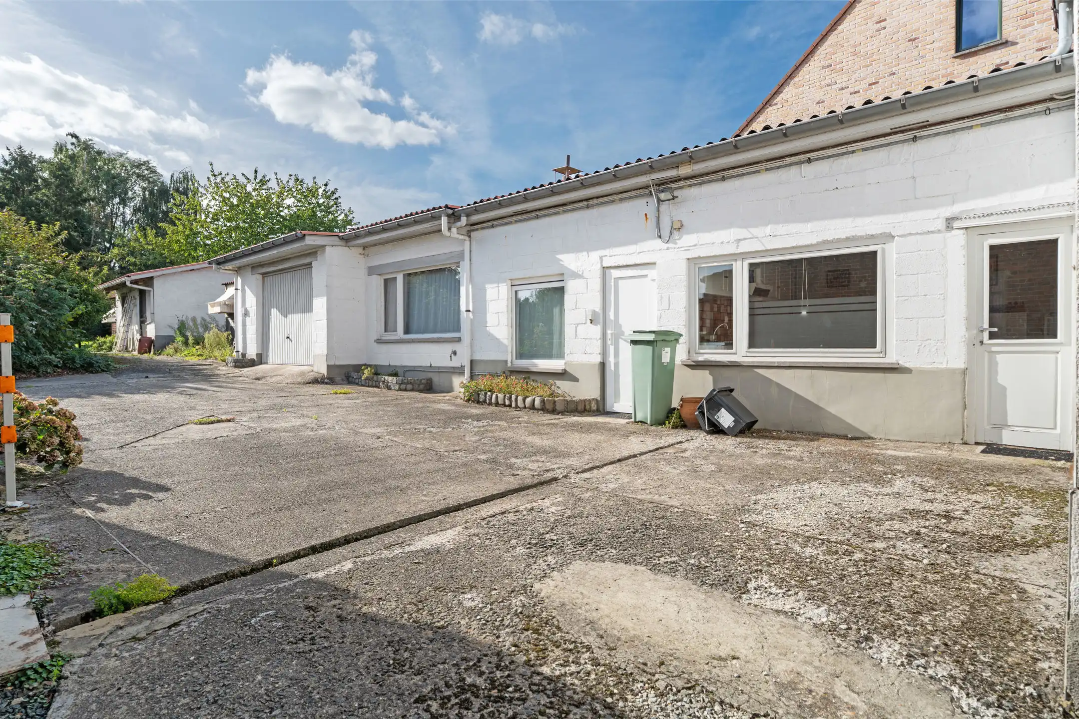 Charmante 3-gevelwoning met garage en tuin foto 20