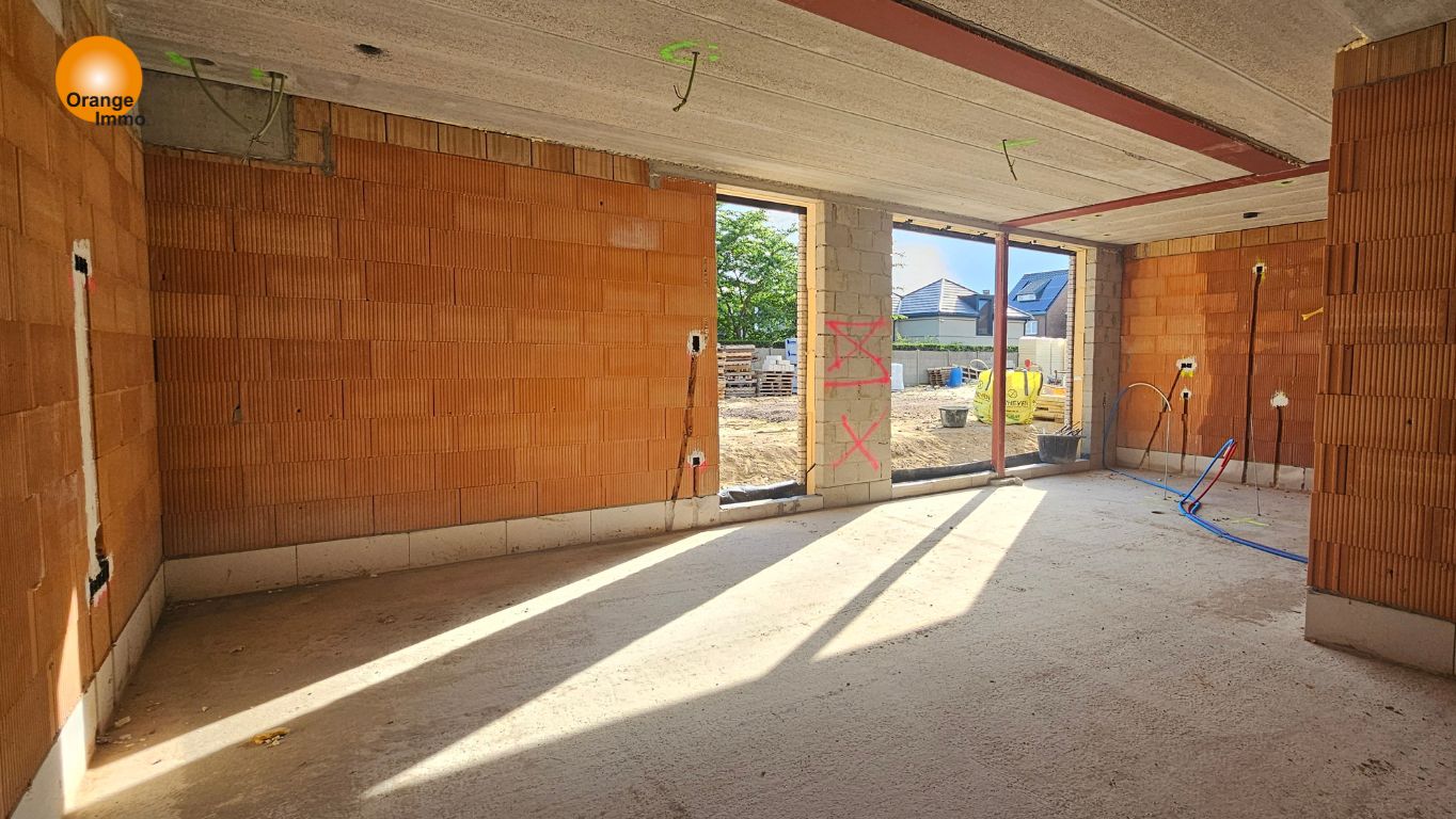 Luxe gelijkvloers appartement van 103m² met zonnig terras 23m² en tuin 199m² gelegen in het centrum van Maasmechelen.  foto 4