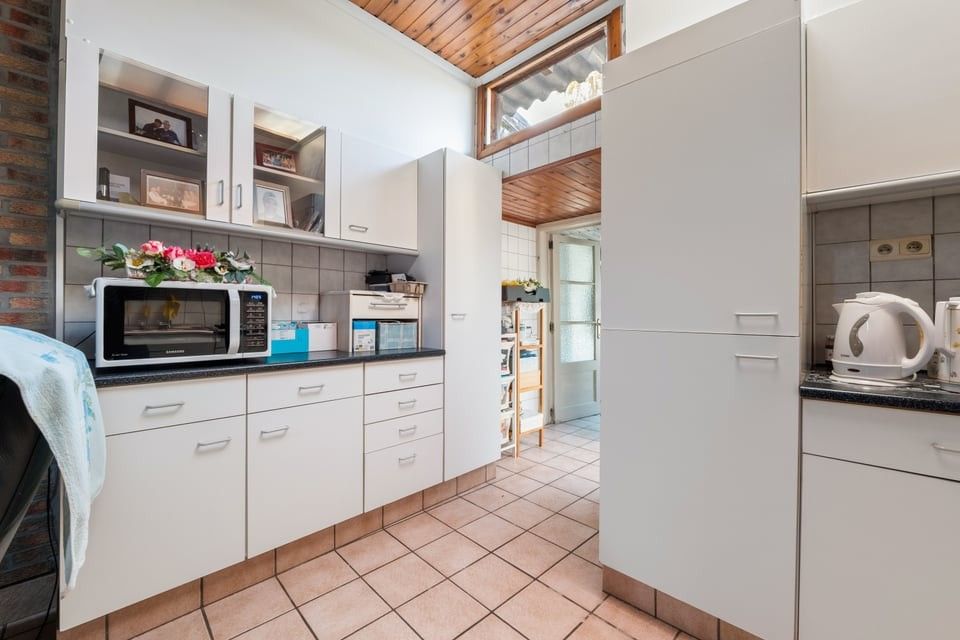 TE RENOVEREN STADSWONING VLAKBIJ HET CENTRUM VAN SINT-TRUIDEN foto 10