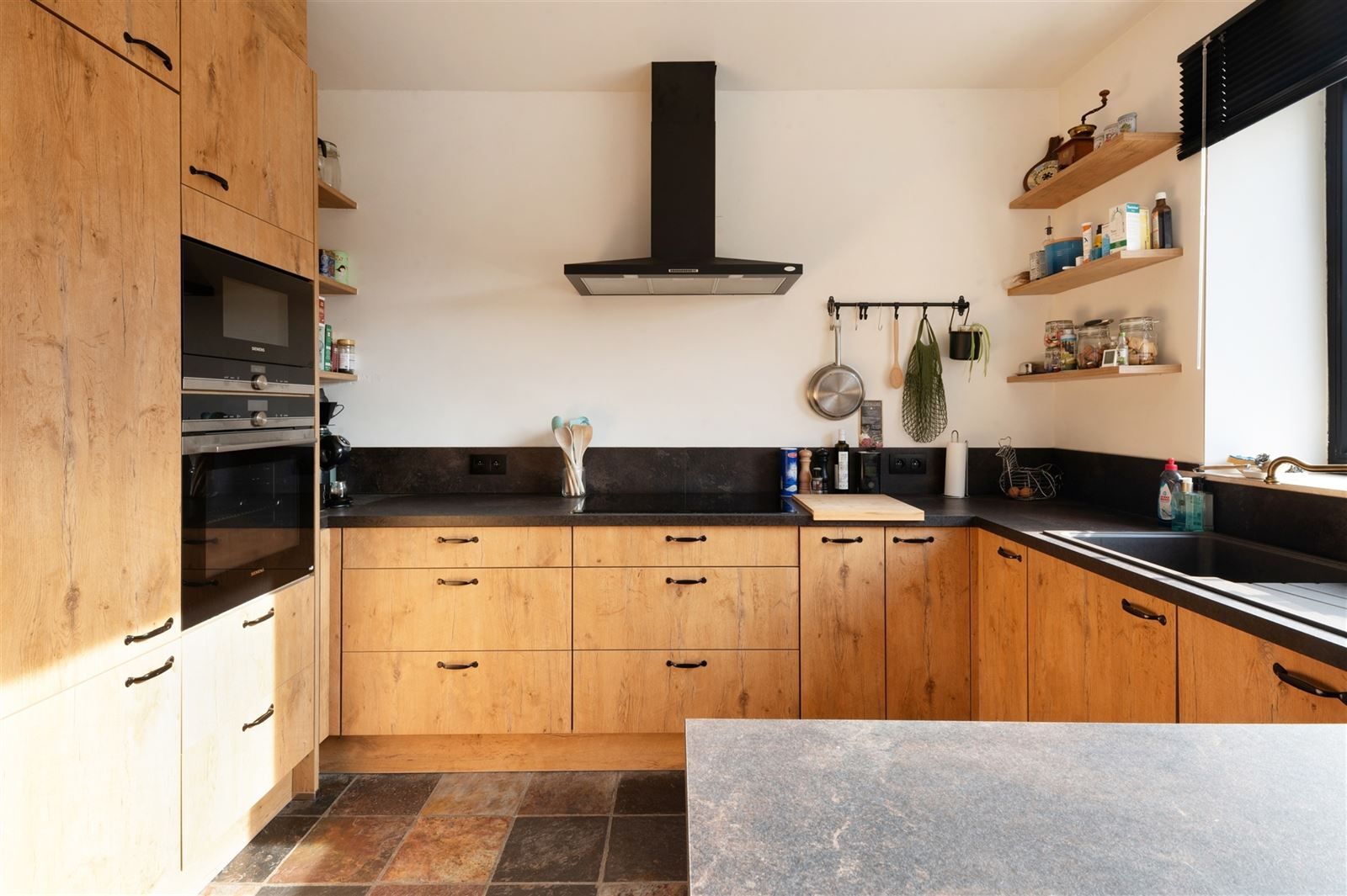 Gezellige gezinswonig met grote tuin op 27are20 foto 8