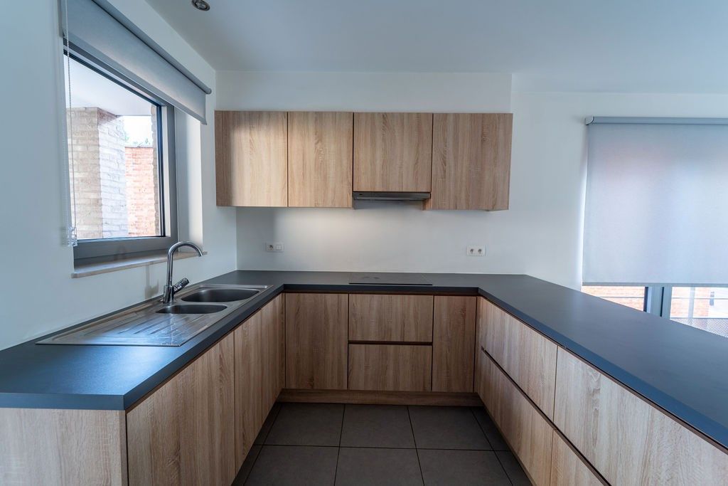 GUNSTIG GELEGEN 2 SLAAPKAMER APPARTEMENT 94 M² MET ONDERGRONDSE AUTOSTANDPLAATS EN KELDERBERGING IN HET CENTRUM VAN ZOLDER foto 7