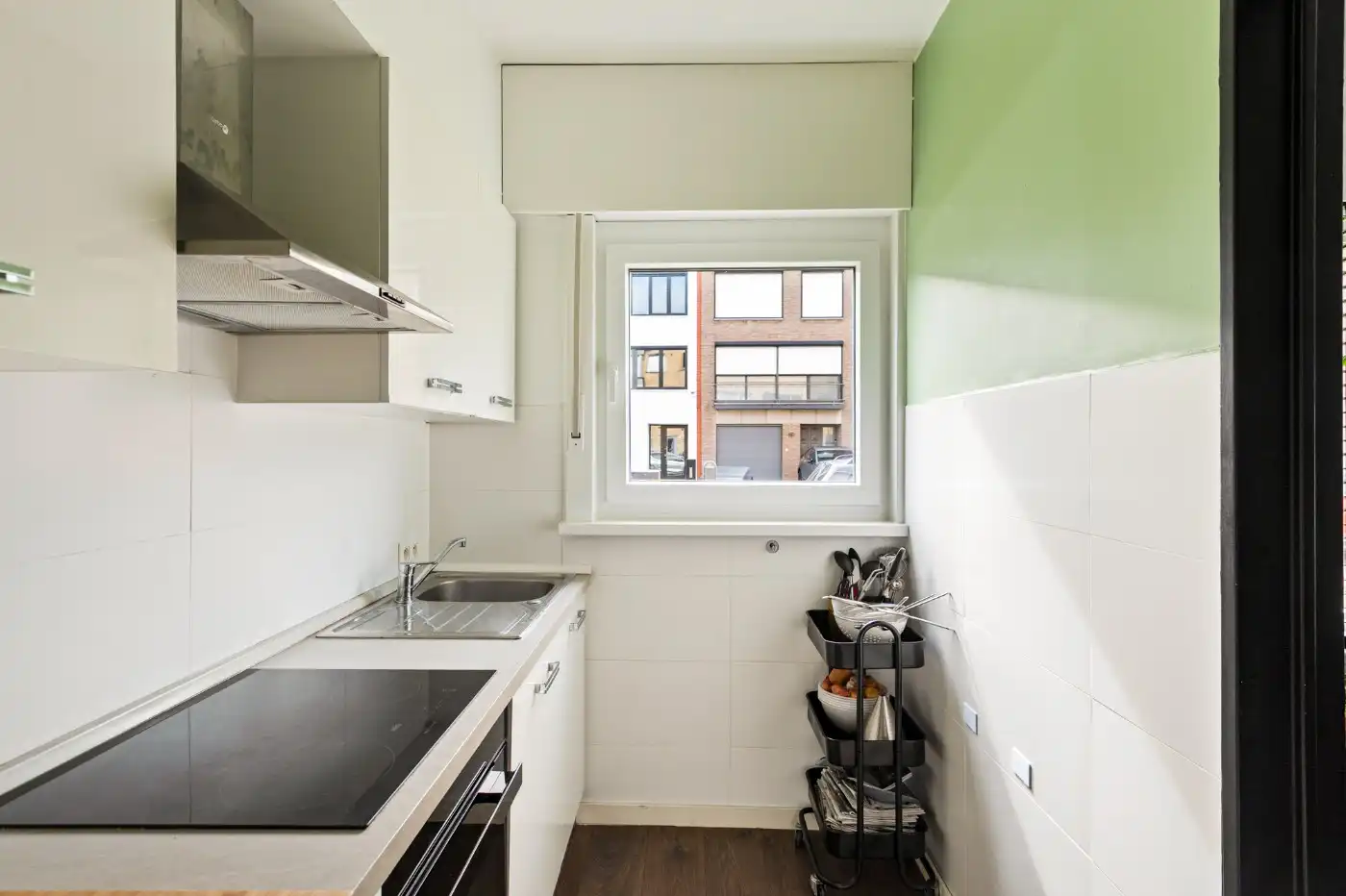 Keurig gerenoveerd, gelijkvloers appt. met 2 slpk., terrasje en garagebox foto 7