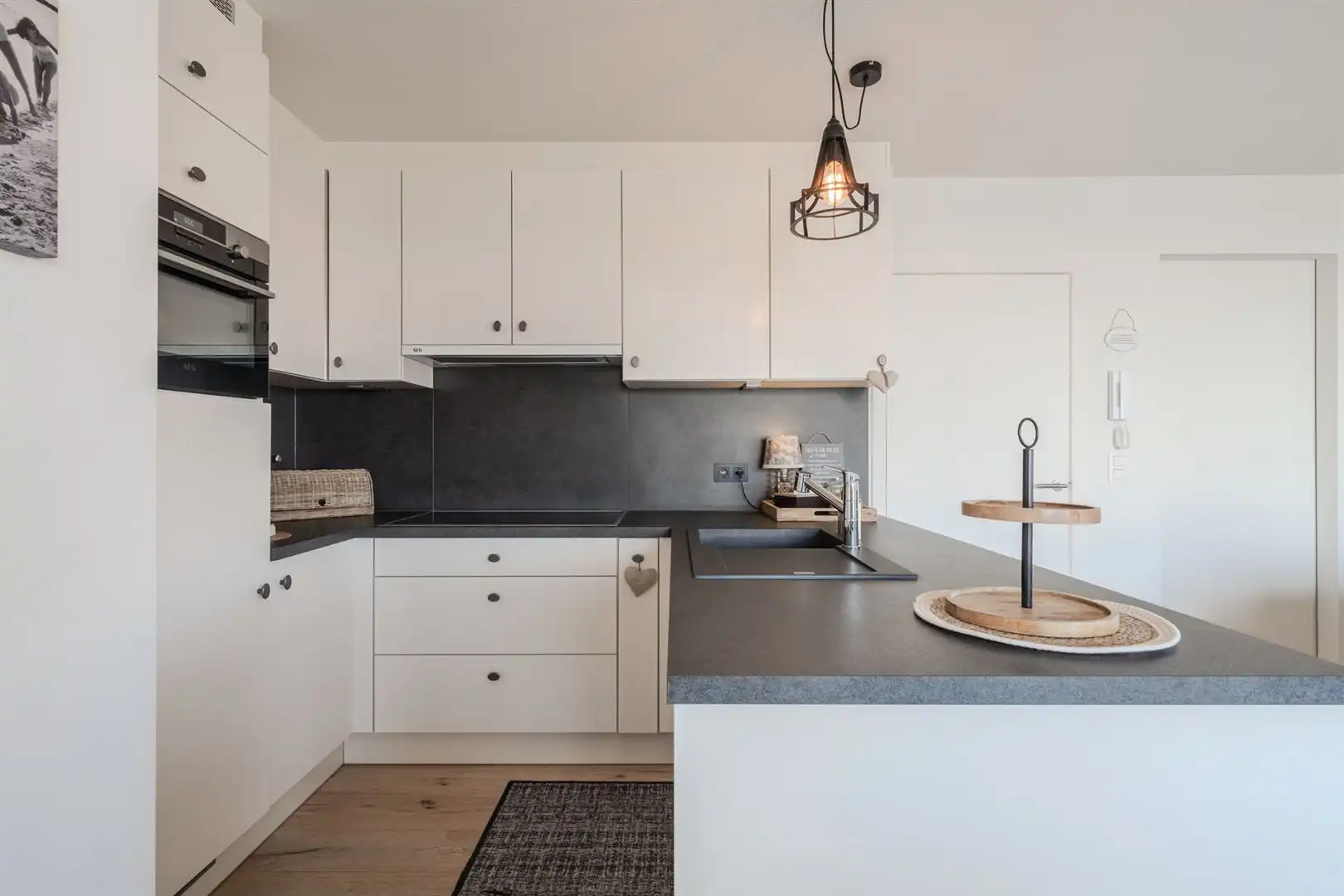 Uniek afgewerkt appartement zongericht in perfecte staat foto 11