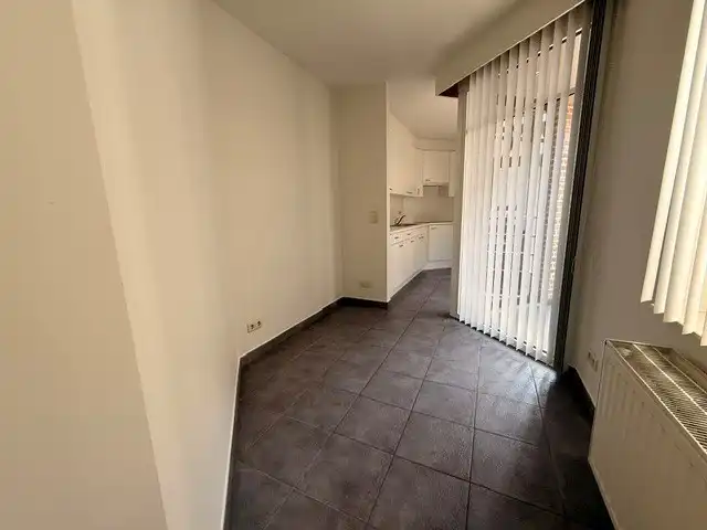 Verzorgd appartement met 1 slaapkamer, terras en lift in het centrum van Maaseik.  foto 4