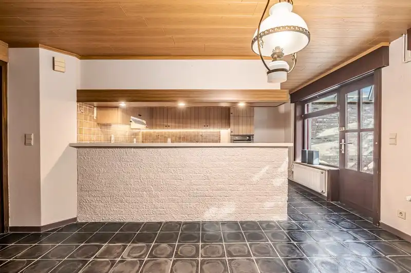 Op te frissen woning met perceel bouwgrond foto 3