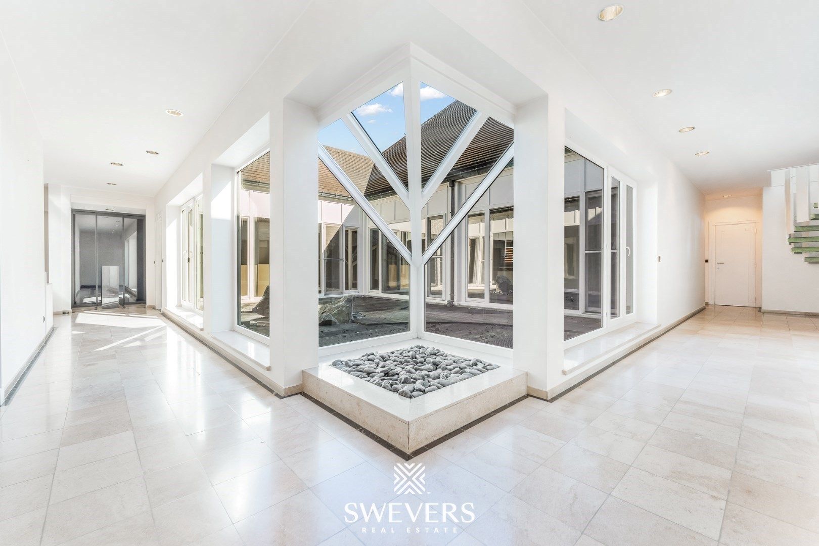 Unieke woon- en handelscombinatie op toplocatie in Lummen ( 928 m2 ) foto 16