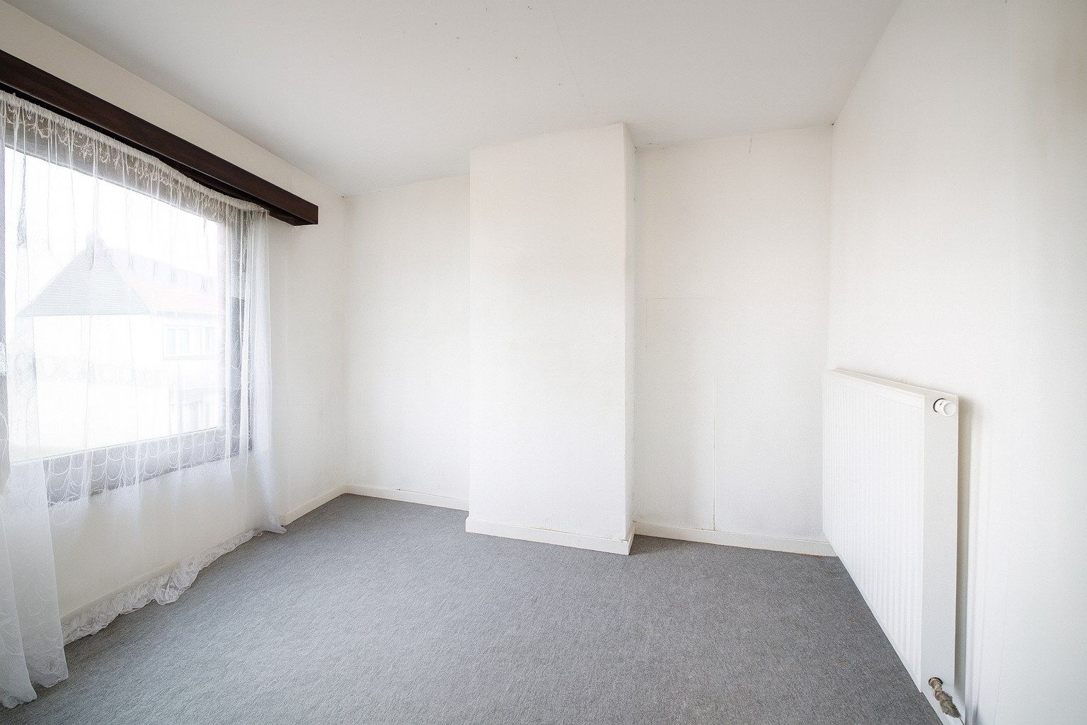 Te koop: Charmante rijwoning met diepe tuin in hartje Sint-Niklaas! foto 7