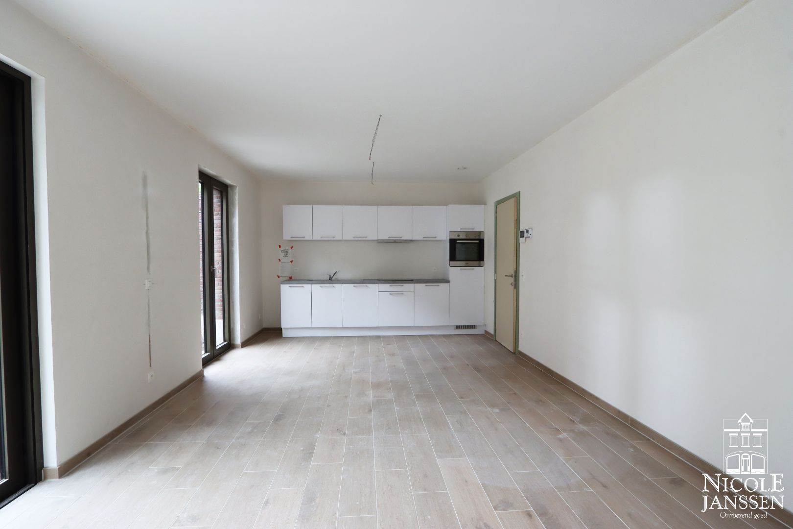 Nieuwbouwappartement met twee slaapkamers en autostandplaats in het centrum van Maaseik foto 3