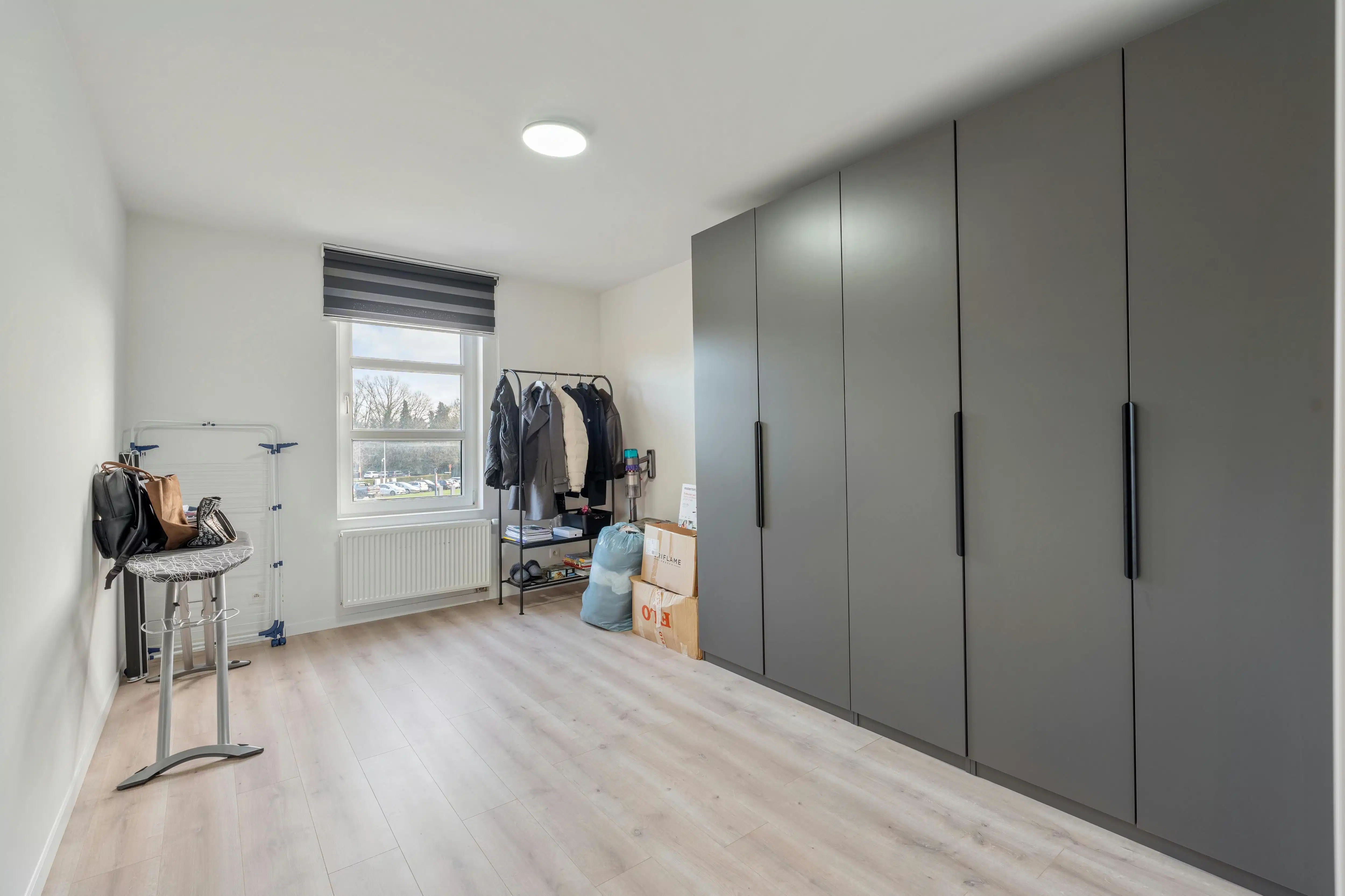 Rendabele opbrengsteigendom met handelspand, magazijn, woonst en 2 appartementen in Genk foto 7