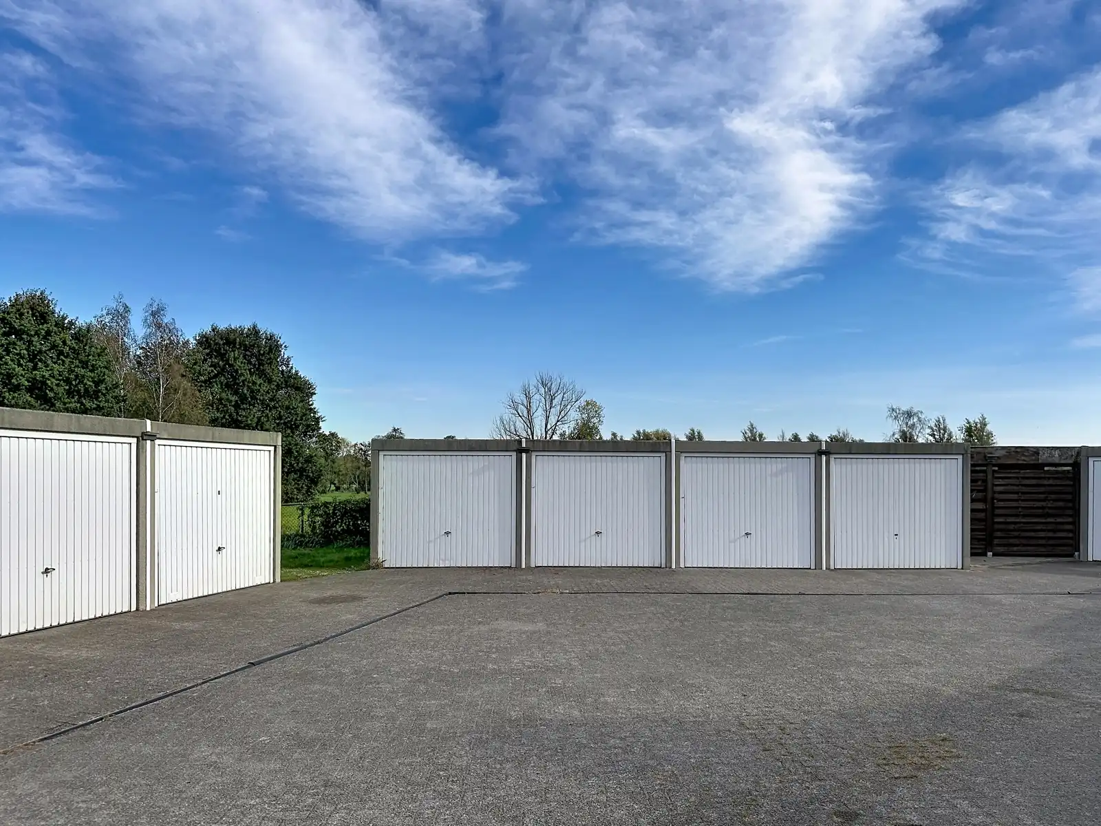 Duplex met gemeenschappelijke tuin en garagebox foto 31