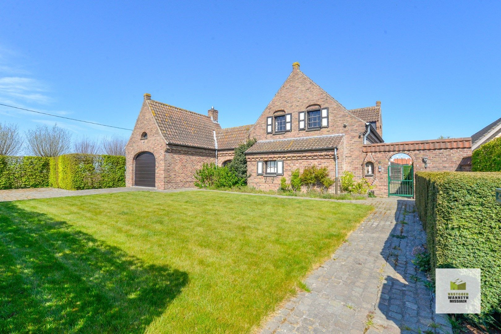 Charmante woning met 4 slaapkamers, garage en tuin op landelijke ligging te Wingene foto 2