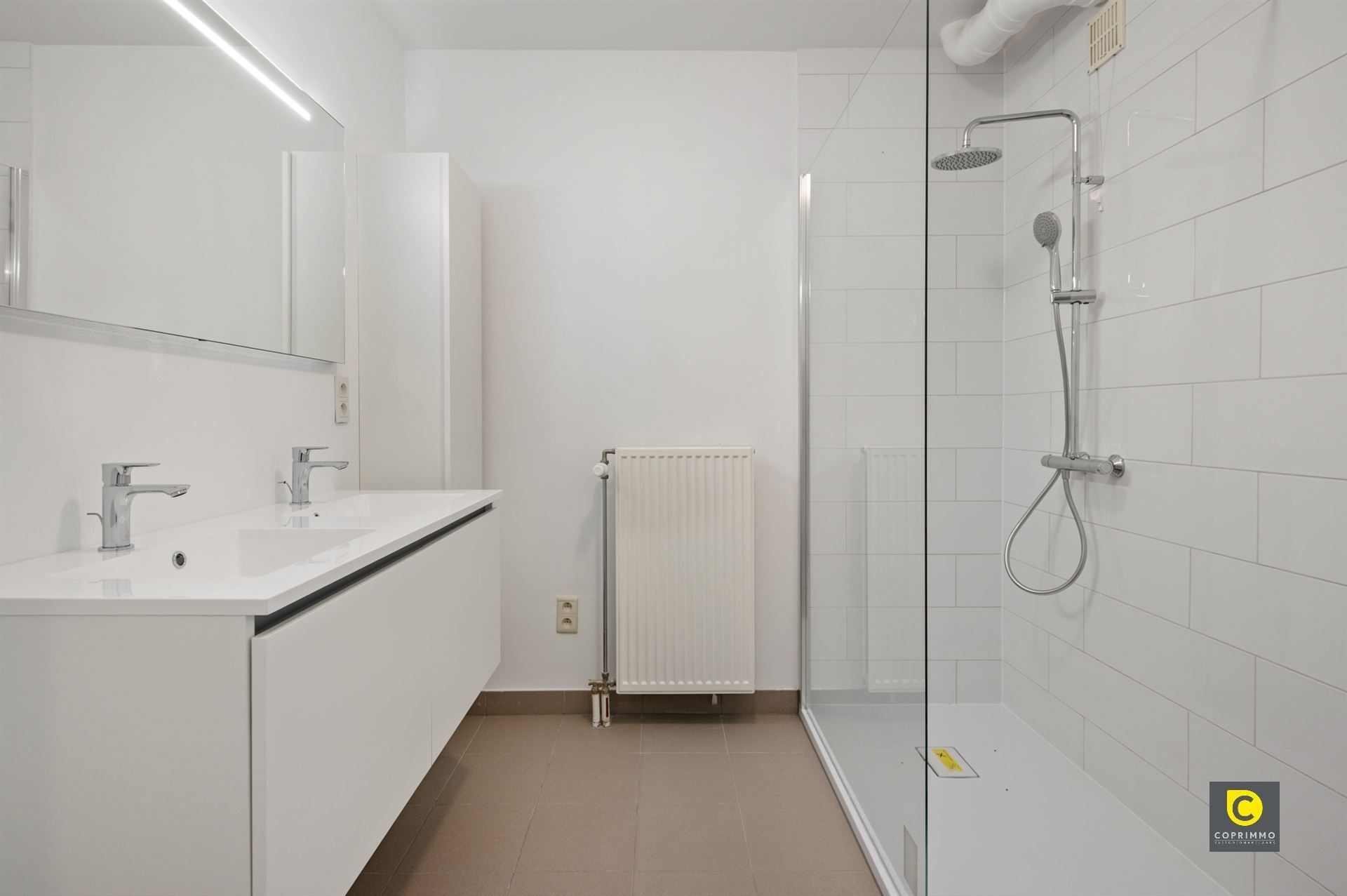 Gelijkvloers app met 2 slpk, tuin en garagebox foto 16