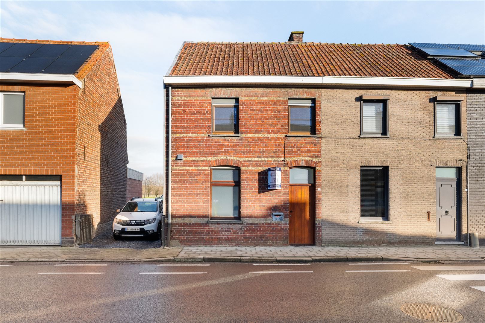 Halfopen bebouwing met garage foto 2