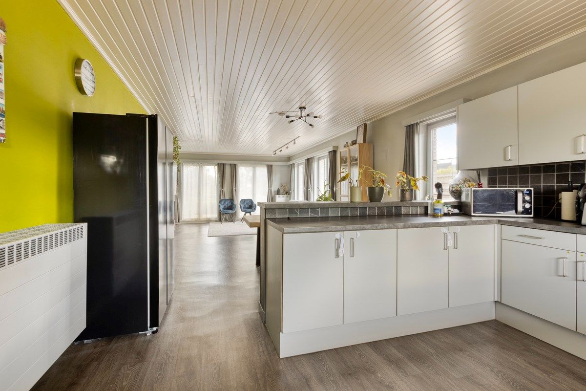 Rustig gelegen gelijkvloers woning met 2 slpks en ruime zolder. foto 8