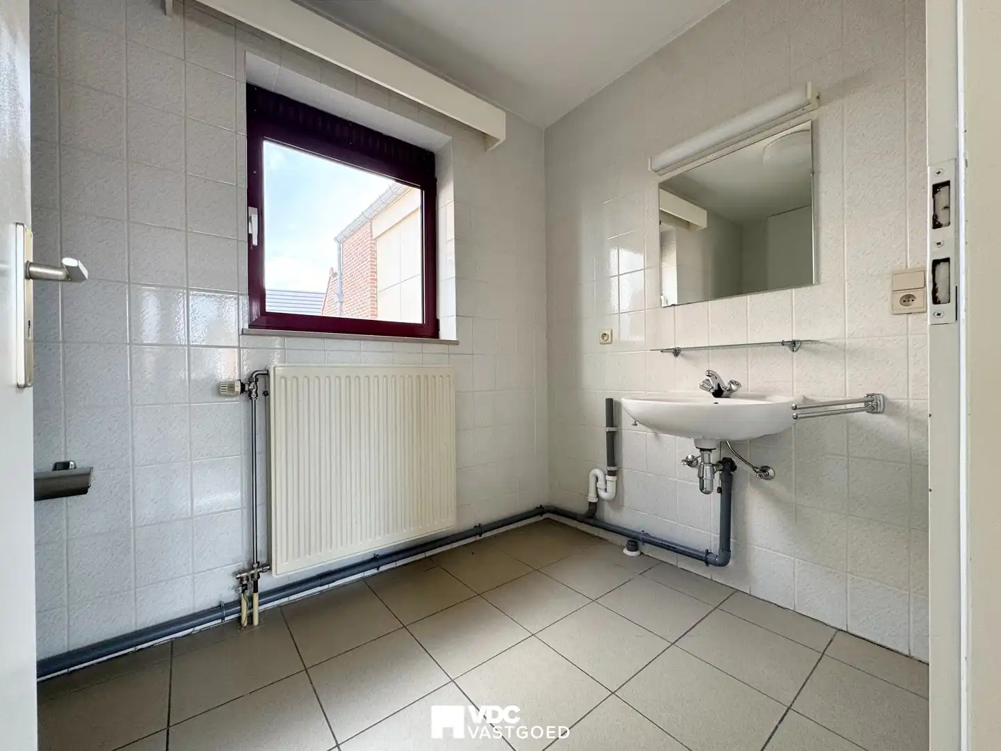 Mooi appartement met 1 slaapkamer in centrum Borgloon foto 7