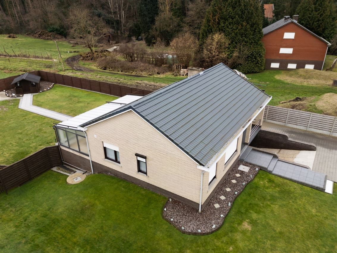 Netjes onderhouden woning op 11a95 grenzend aan agrarisch gebied foto 42