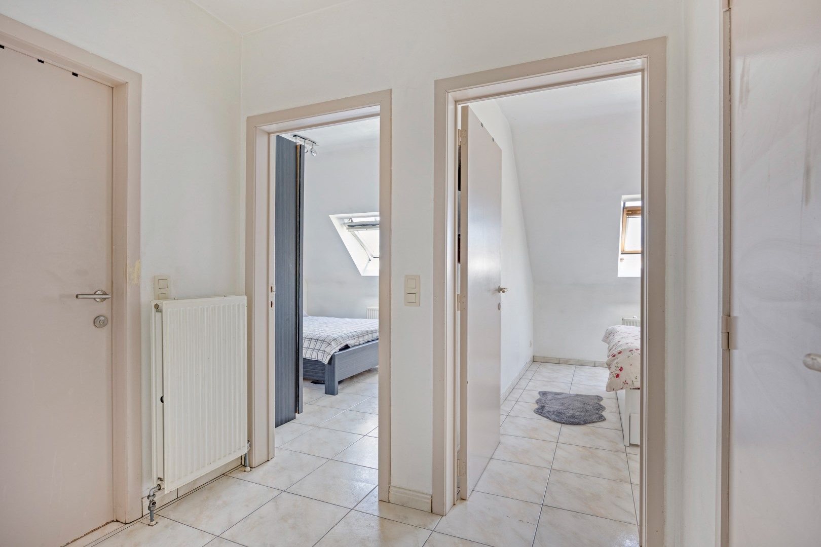 Ruim en licht appartement met 2 slaapkamers én zolderruimte foto 12