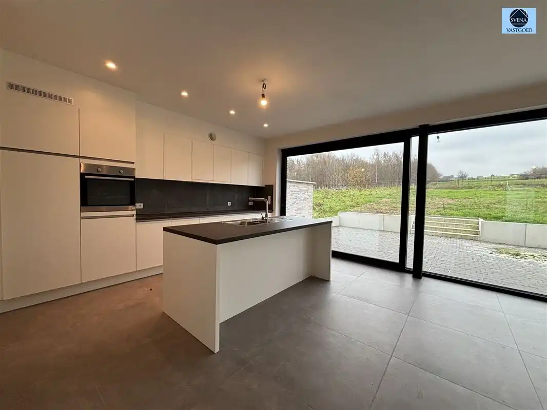 NIEUWBOUWWONING MET 4 SLAAPKAMERS EN GARAGE. foto 3