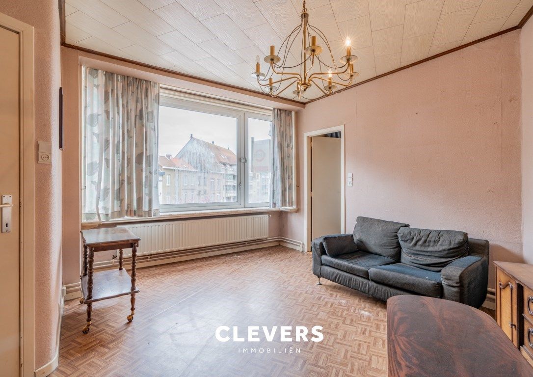 Opbrengsteigendom met lopende handelshuur + 2 appartementen foto 12
