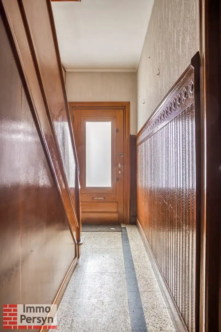 Te renoveren woning met 3 (mogelijks 4) slaapkamers en tuin met uitweg foto 8