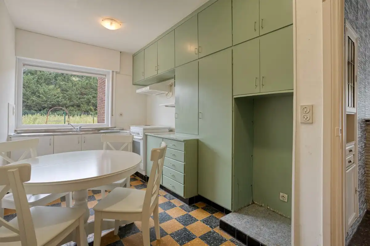 Op te frissen gelijkvloerse woning met 1 slaapkamer en garage! foto 7