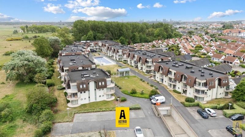 Mooi vakantieappartement met parking in groen domein met zwembad! foto 2