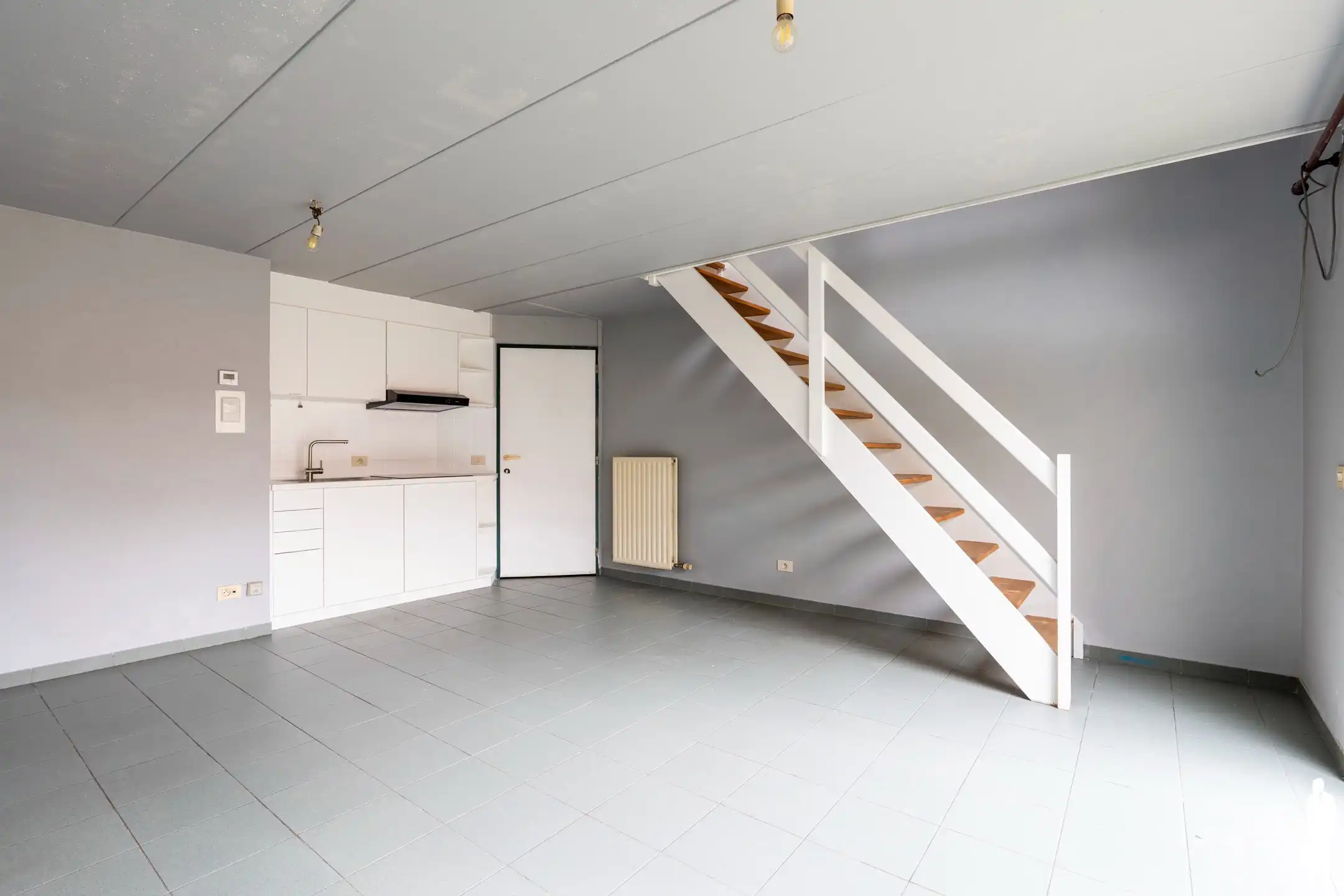 Duplex-appartement met stadstuintje nabij de Grote Markt  foto 2
